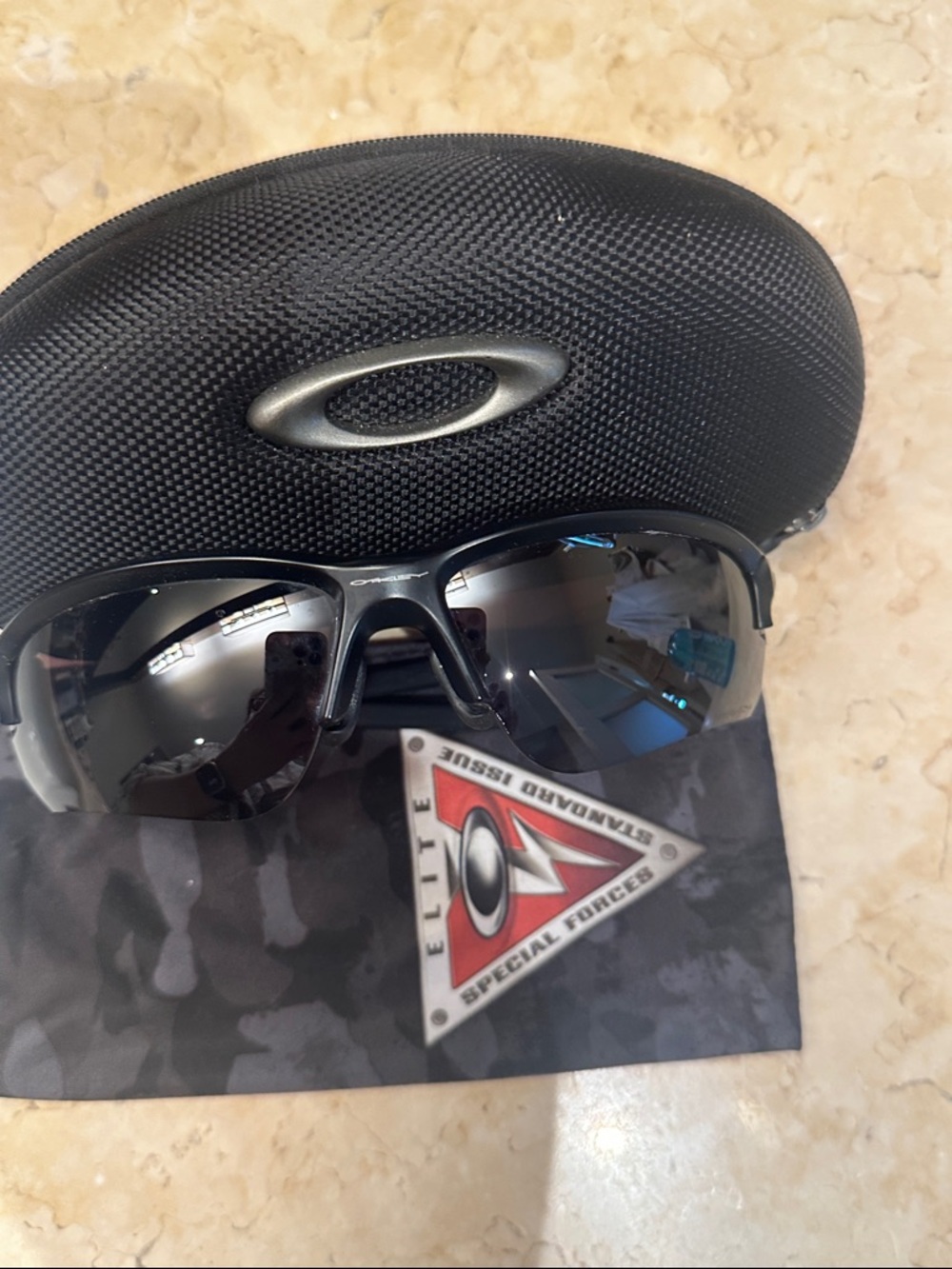 Oakley Black Wraparound Sunglasses with Smoke Lenses
